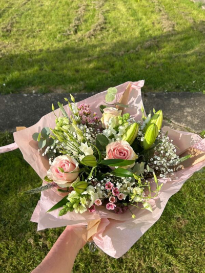 Blush Beauty - A soft and elegant bouquet filled with delicate blush tones, fresh whites, and natural greenery. Designed in a relaxed, garden-inspired style, it has a light and airy feel with lovely texture and movement throughout. The gentle colour palette gives it a romantic and timeless look, making it perfect for thoughtful gifting, celebrations, or simply brightening someone’s day with understated beauty.